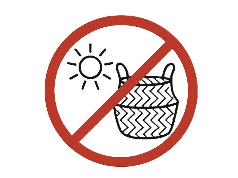 Do not dry seagrass basket in sun. Red circle with slash over sun and basket. Prevents warping.