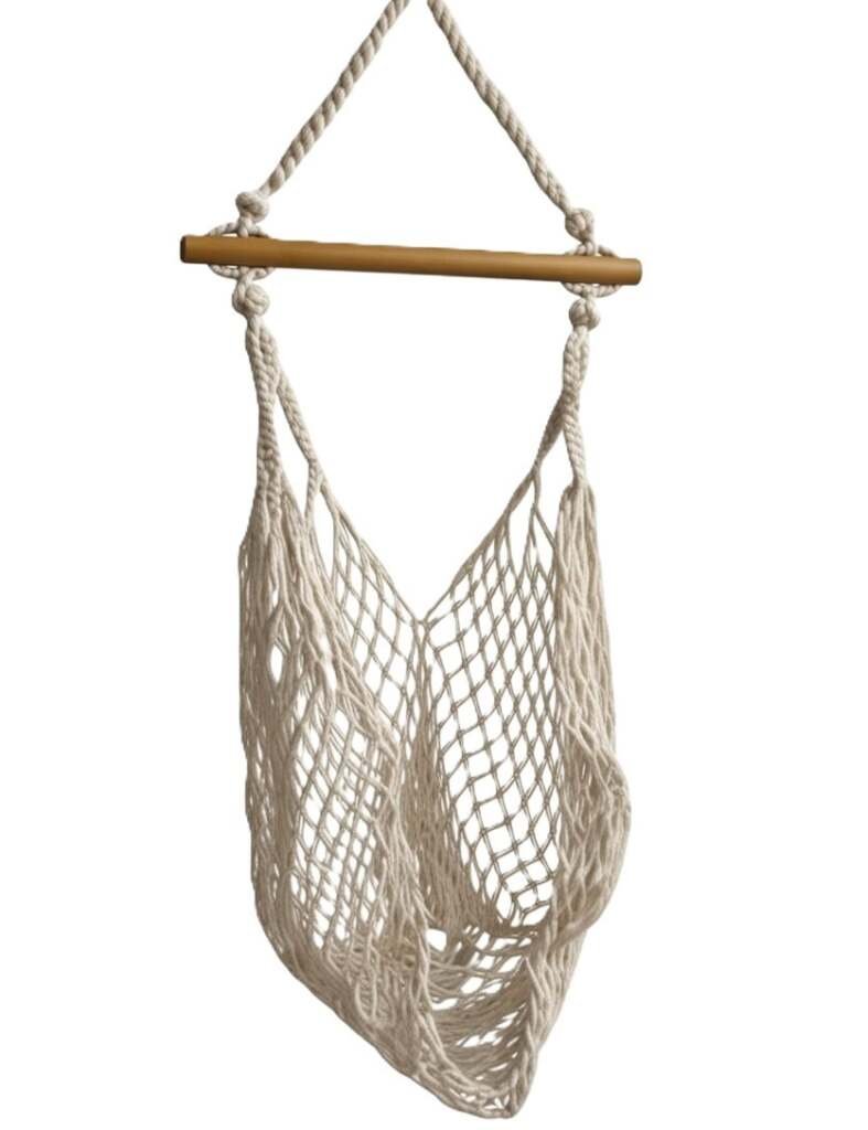 Minimalist cotton rope net hammock chair hanging from a wooden spreader bar.