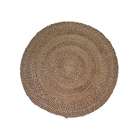 Round natural fiber table mat, eco-friendly handwoven jute placemat for rustic dining décor.