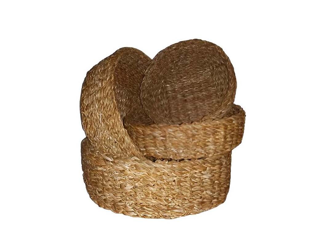 Rolled up woven seagrass material, showing the coiled, thick texture. Raw fiber for basket making.