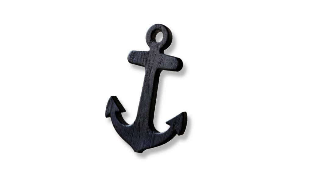 Dark stained wooden decorative anchor wall hanging for nautical themed home décor.