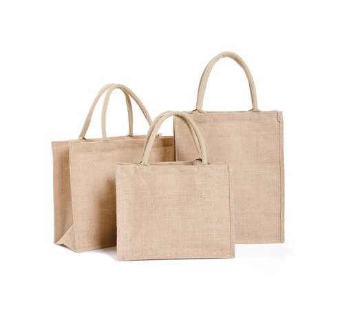 Three natural jute tote bags in varying sizes for eco-friendly wholesale shopping and reusable storage.