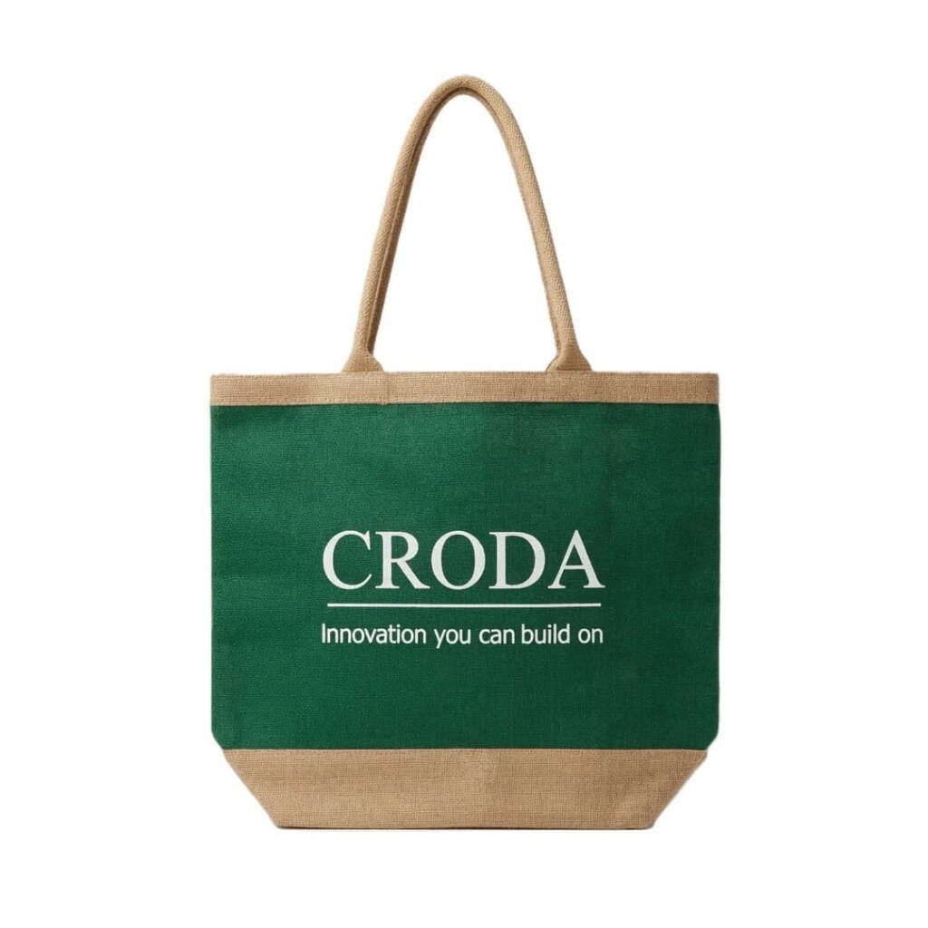 Custom branded promotional jute bags in forest green featuring a white corporate logo for B2B gifting.